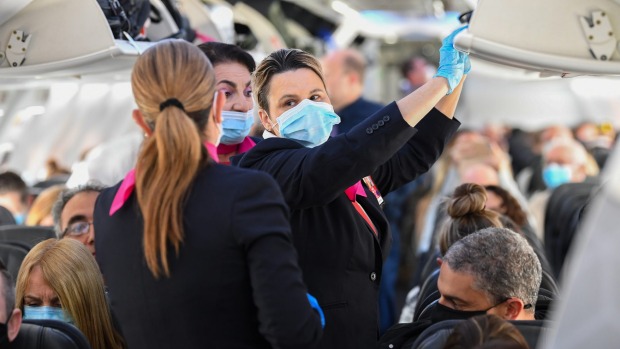 COVID-19 y viajes aéreos: los expertos dicen que deberíamos seguir usando máscaras después de la pandemia